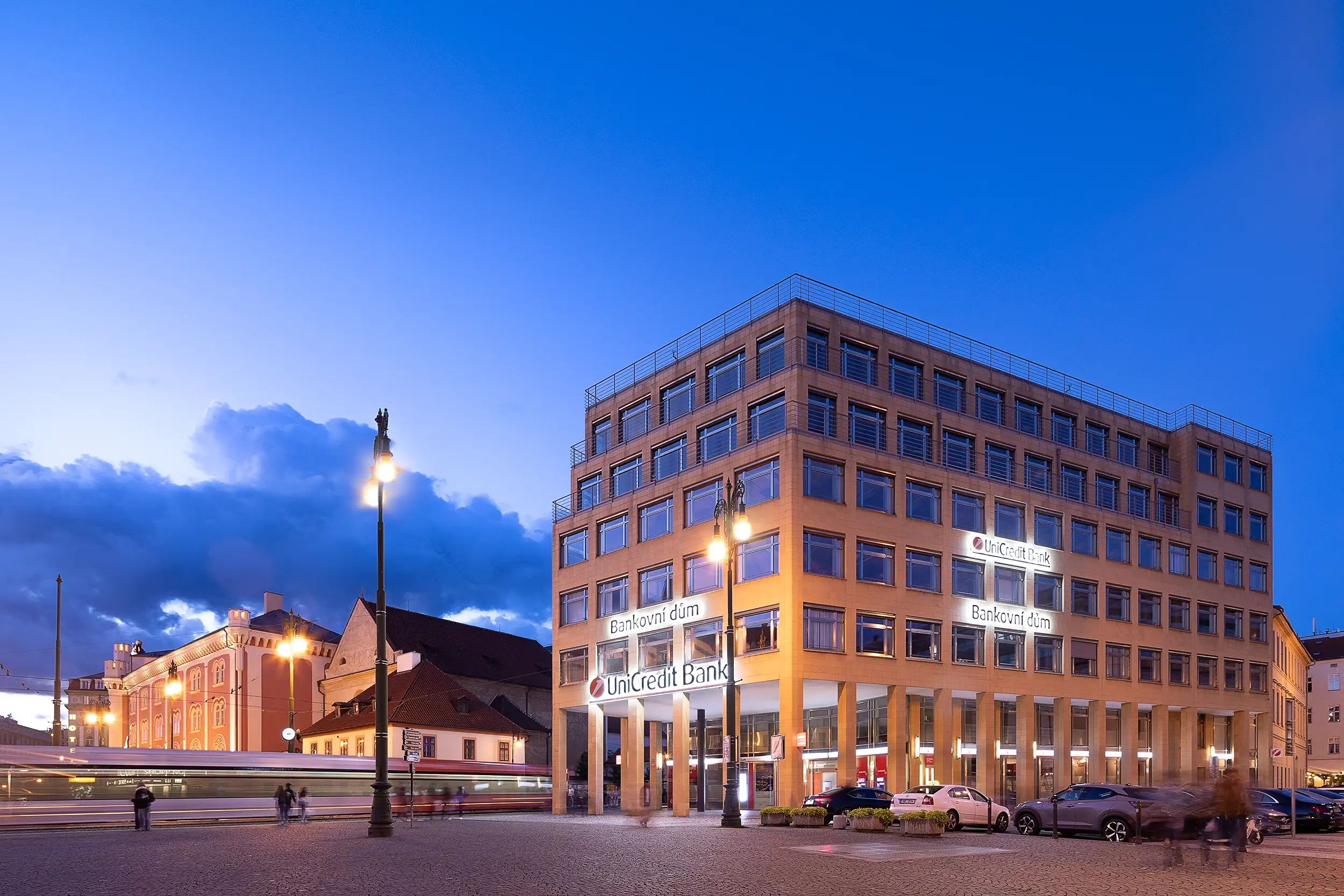 UniCredit Bank's Banking House by Bernhard Winking on Republic Square in Prague photographed during blue hour.