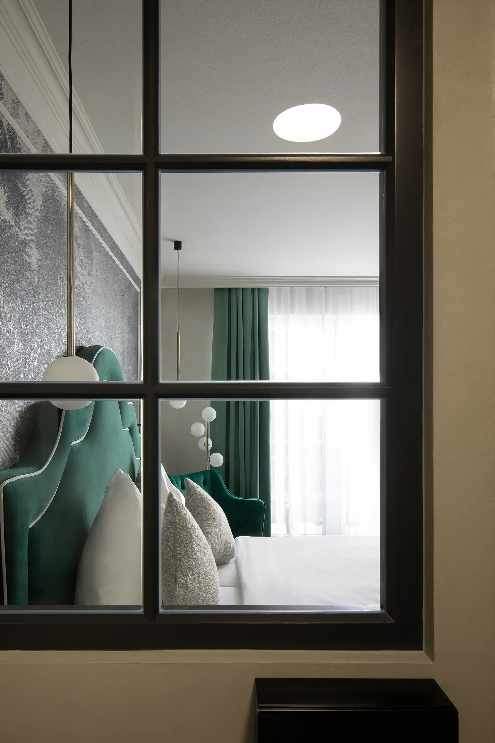 View through the bathroom window into the hotel room.
