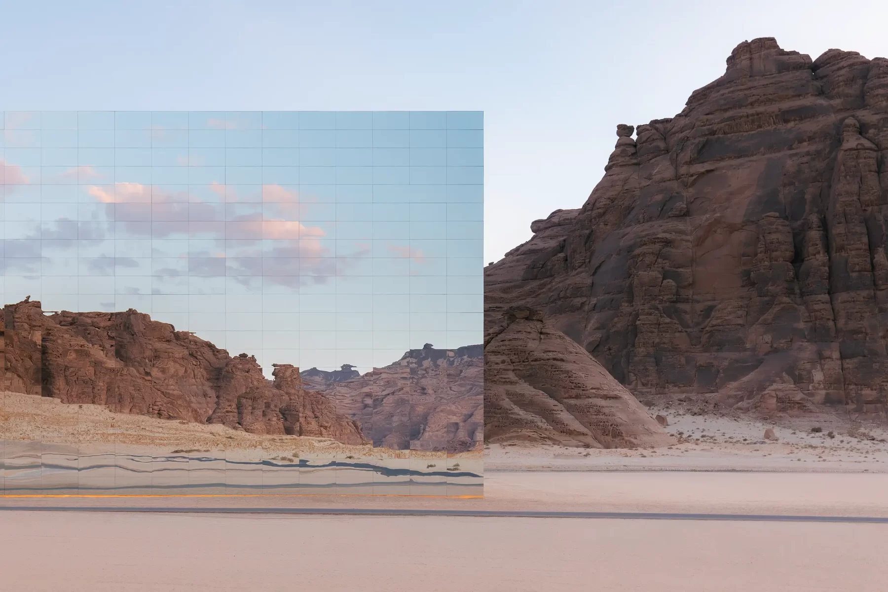 The mirrored facade absorbs the surrounding landscape and dissolves the boundary between the building and the surrounding space, Maraya (Al Ula), captured by architectural photographer Ondrej Hromadko.